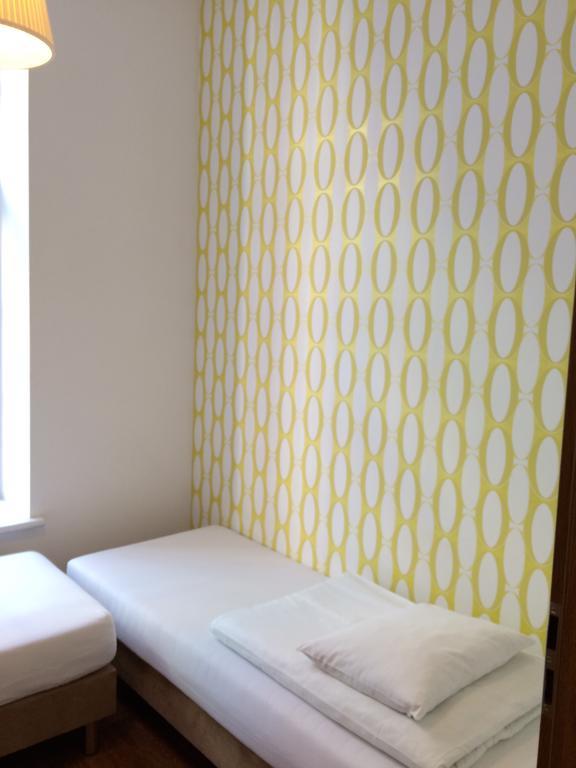 Grand Guesthouse Apartament Гданск Стая снимка